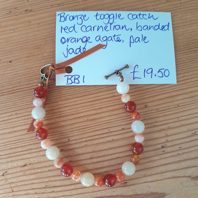Bronze Toggle Catch Bracelet with Red Carnelian, Banded Orange Agate and Pale Jade.