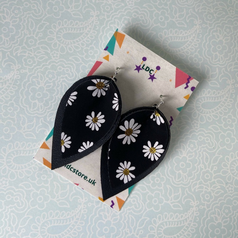 Daisy Print and Black Pinched Leaf Shaped Earrings in Faux Leather