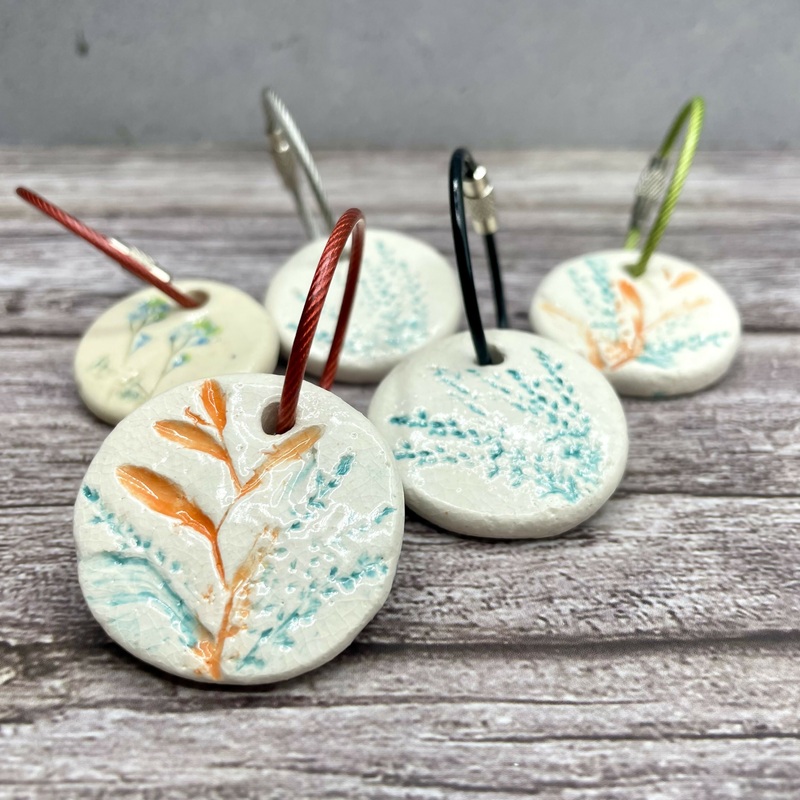 Botanical Ceramic Keyring  Hand-Pressed Floral Design with Colour Wire Loop