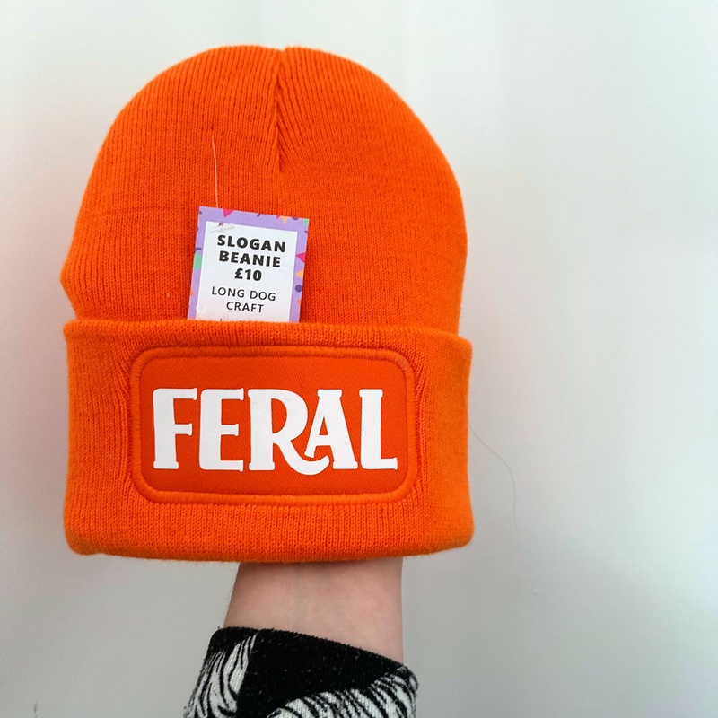 Feral Cuffed Rectangular Patch Beanie Hat
