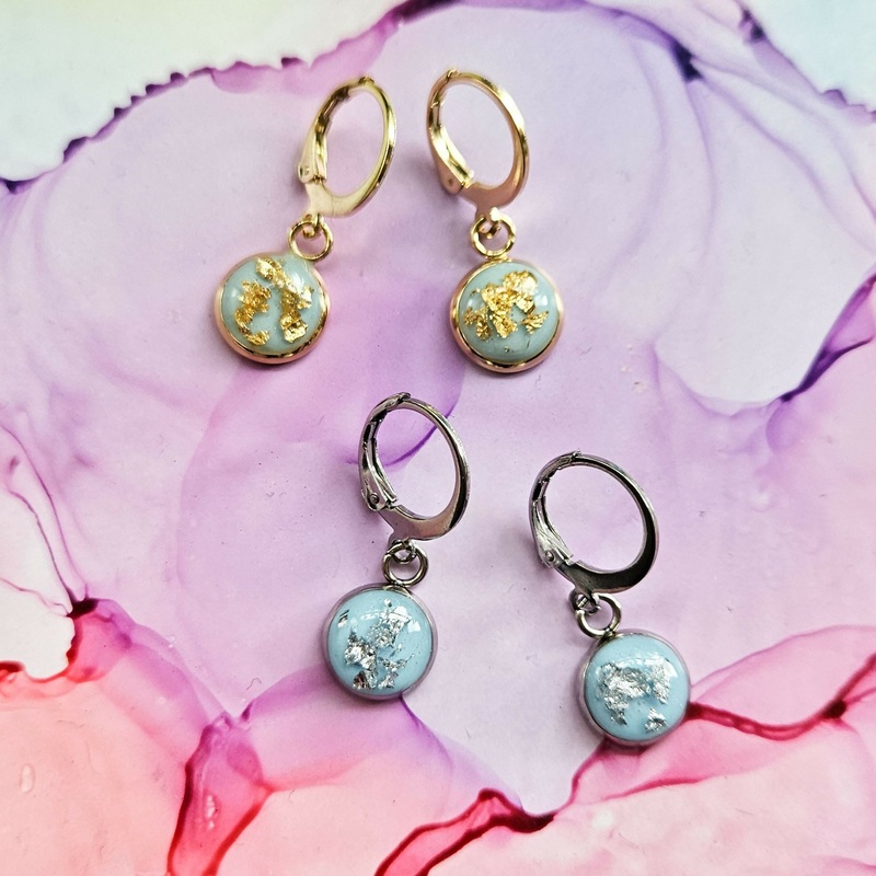 Handmade Baby Blue And Encased Metallic Leaf Resin Charms On Huggie Hoops