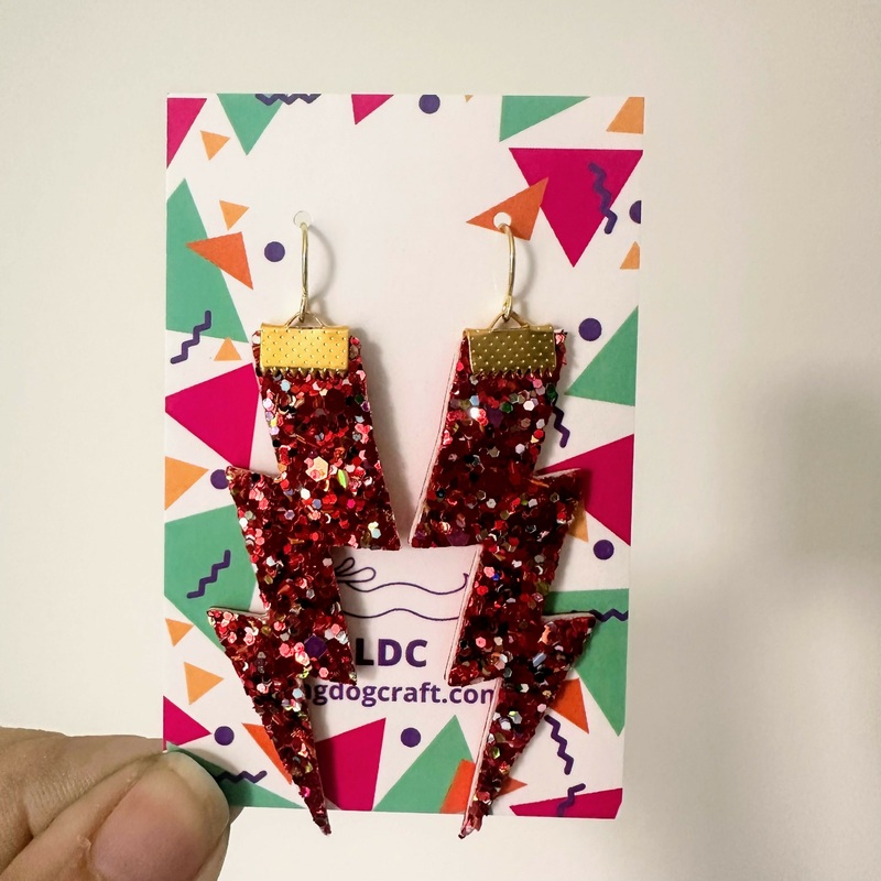 Flash Lightning Bolt Earrings in Red Glitter