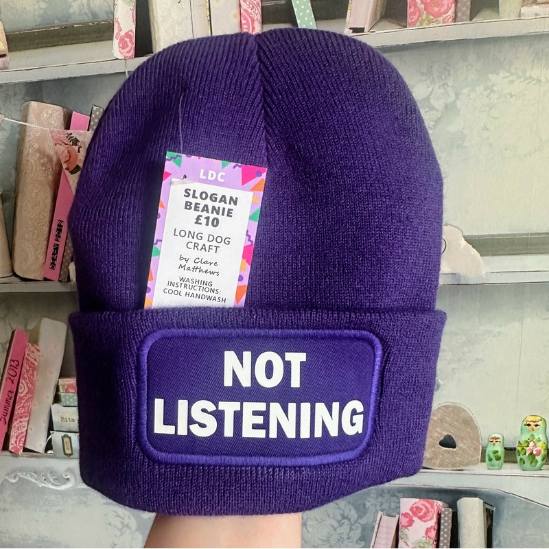 Not Listening Cuffed Rectangular Patch Beanie Hat