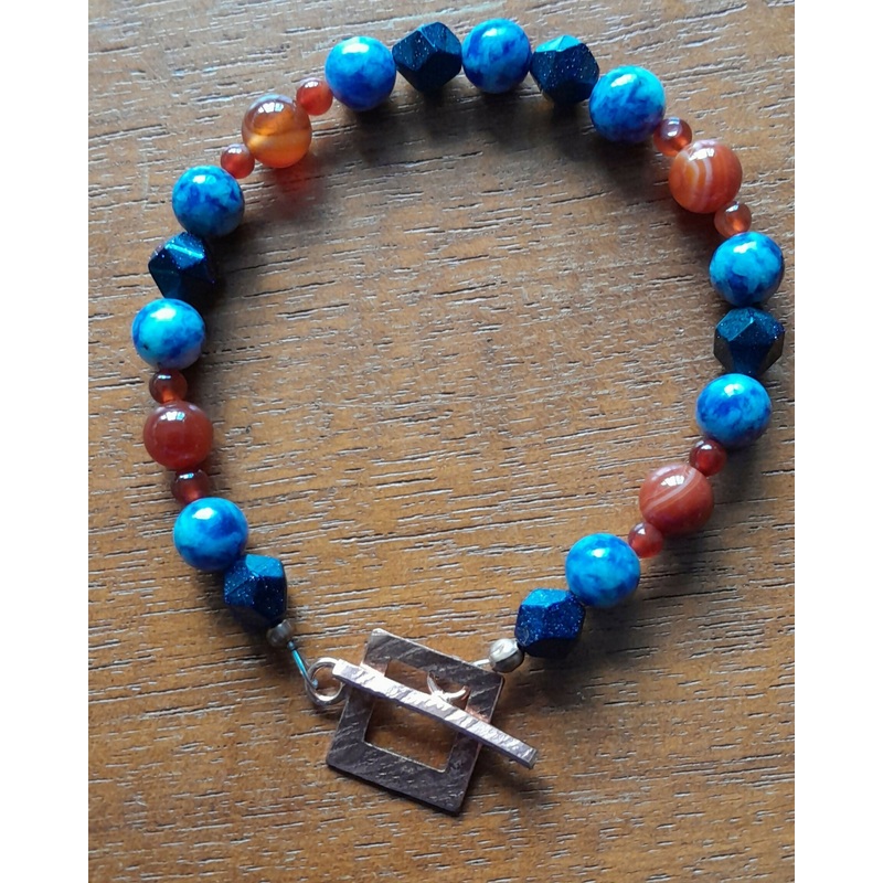 Hand Hammered Pure Copper Toggle Catch with Faceted Navy Goldstone, Blue Spotted Jasper and Carnelian.