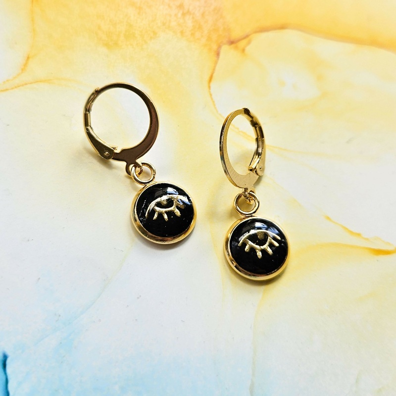 Handmade Black And Gold Evil Eye Resin Charms On Huggie Hoops