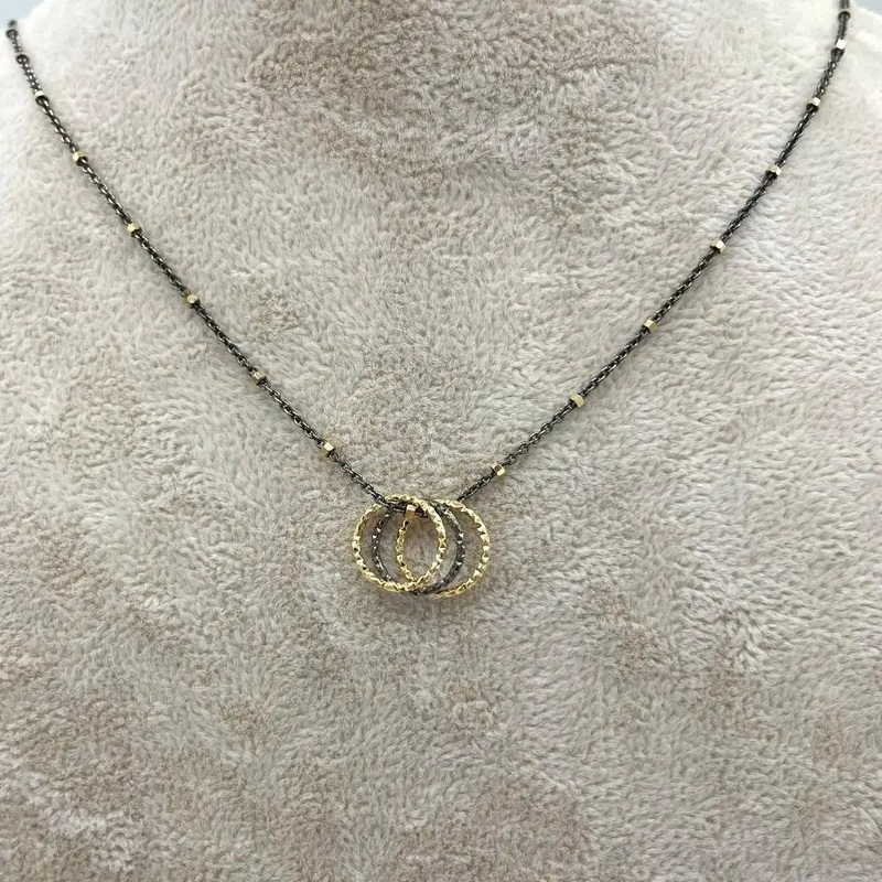 NY Two-Tone Dk Rhodium 3 Cut Rings Necklace
