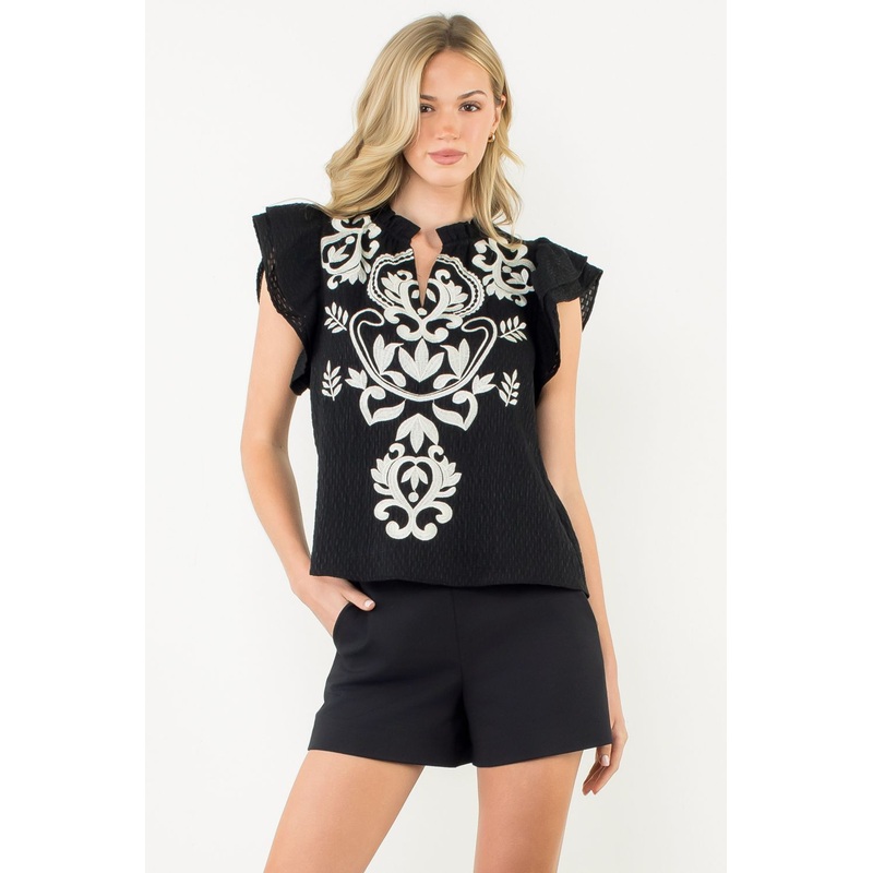 Th Black and Ivory Embroidered Front Textured Top